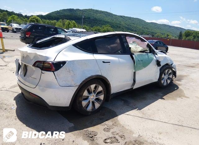 7SAYGDEE4PA107607 2023 Tesla Model Y photo no. 4