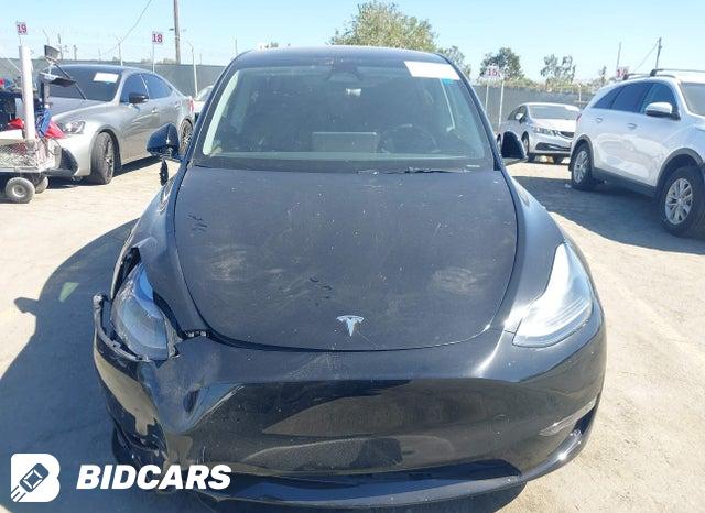 2025 Tesla MODEL Y — VIN 7SAYGDEE6SF299530, şəkil 12