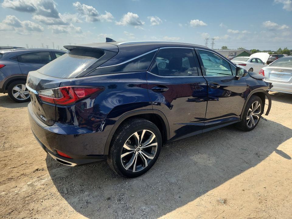 2021 Lexus RX — VIN 2T2HZMDAXMC287275, фото 3