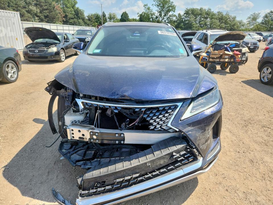 2021 Lexus RX — VIN 2T2HZMDAXMC287275, фото 5