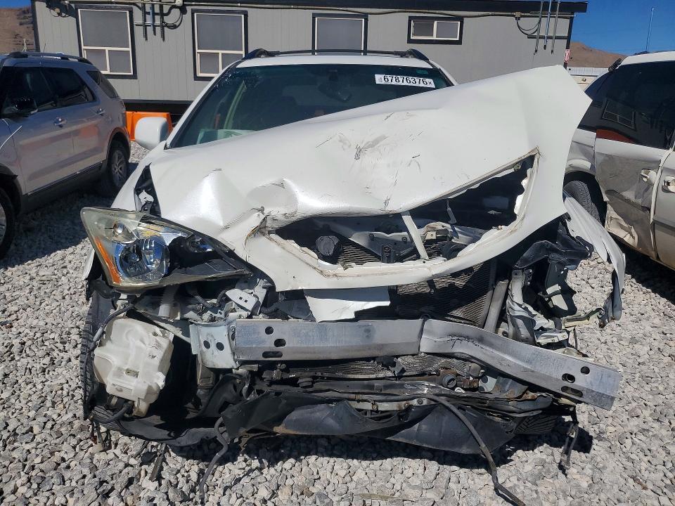 2T2GK31U09C080605 2009 Lexus RX photo no. 5